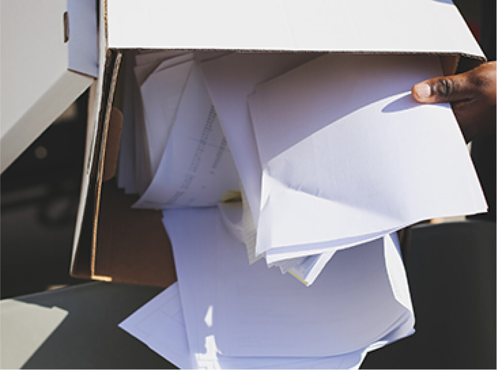 Box of documents being emptied