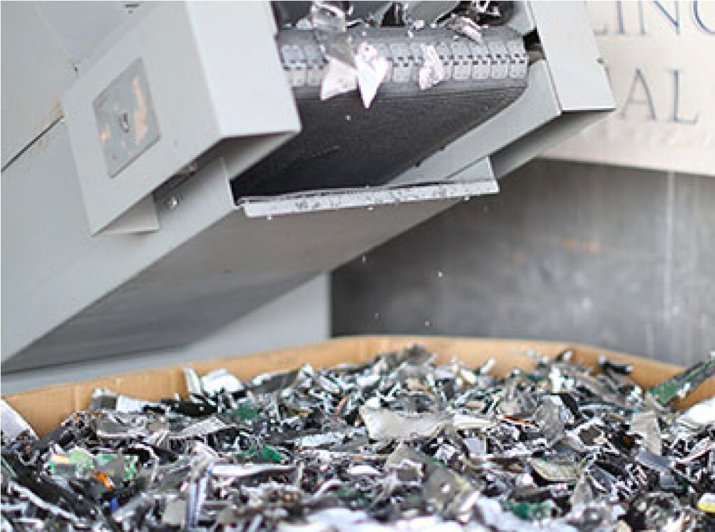 Pile of shredded hard drives and computer media