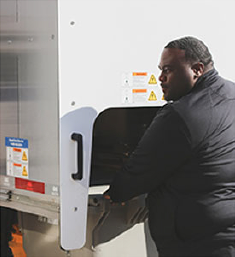 Secured Document Shredding shred truck employee loading truck