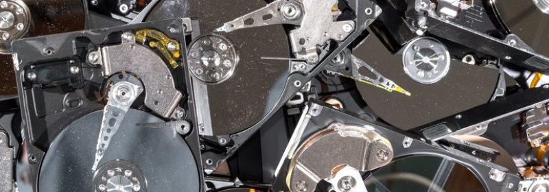 GettyImages-499430982-e1647363224253.jpg stack of old hard drives